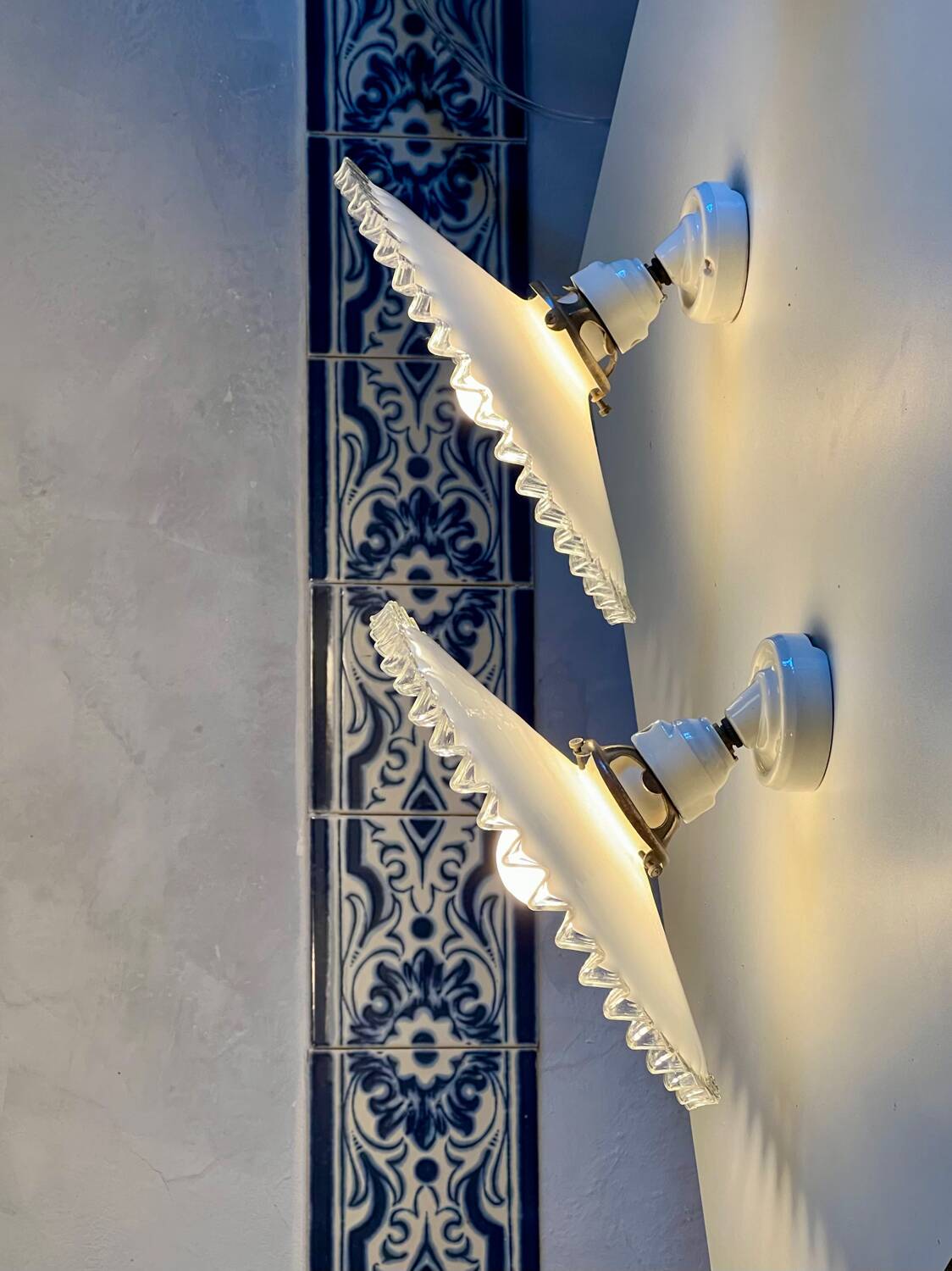 Pair of serrated opaline and porcelain sconces