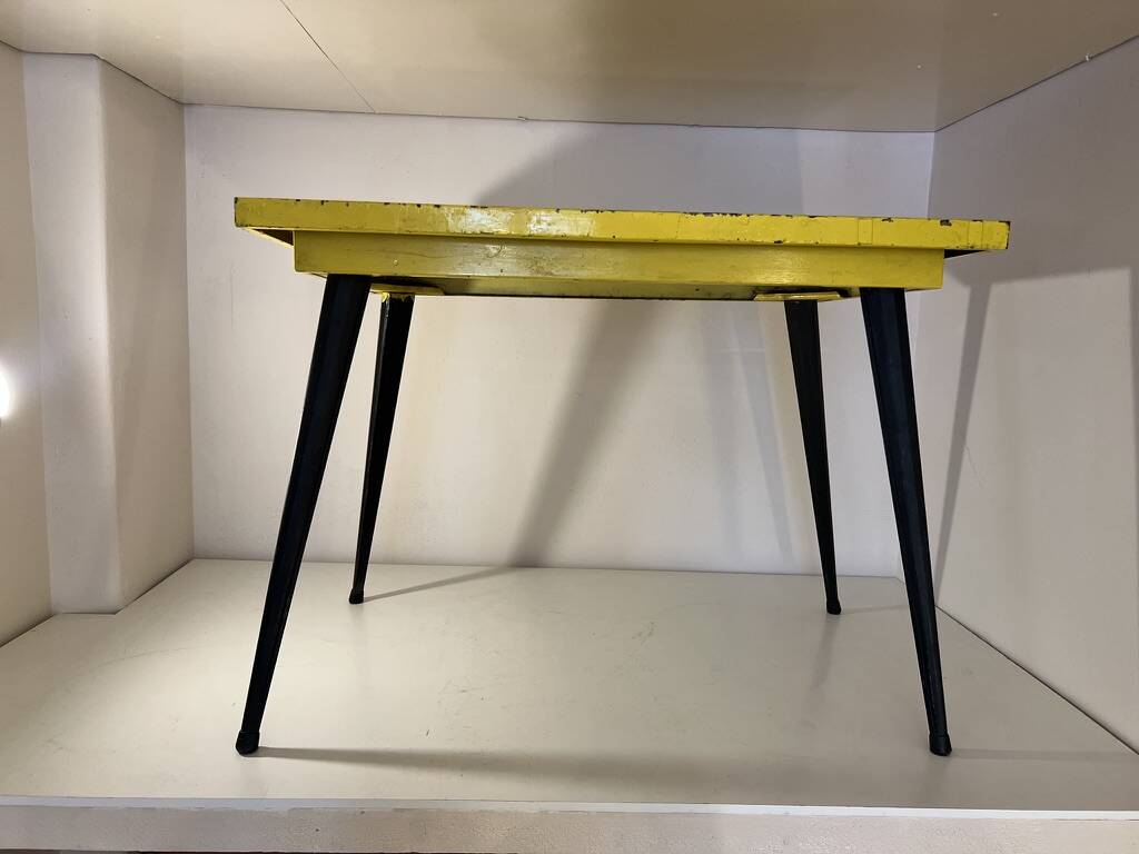 Table in the style of patinated yellow metal Tolix.