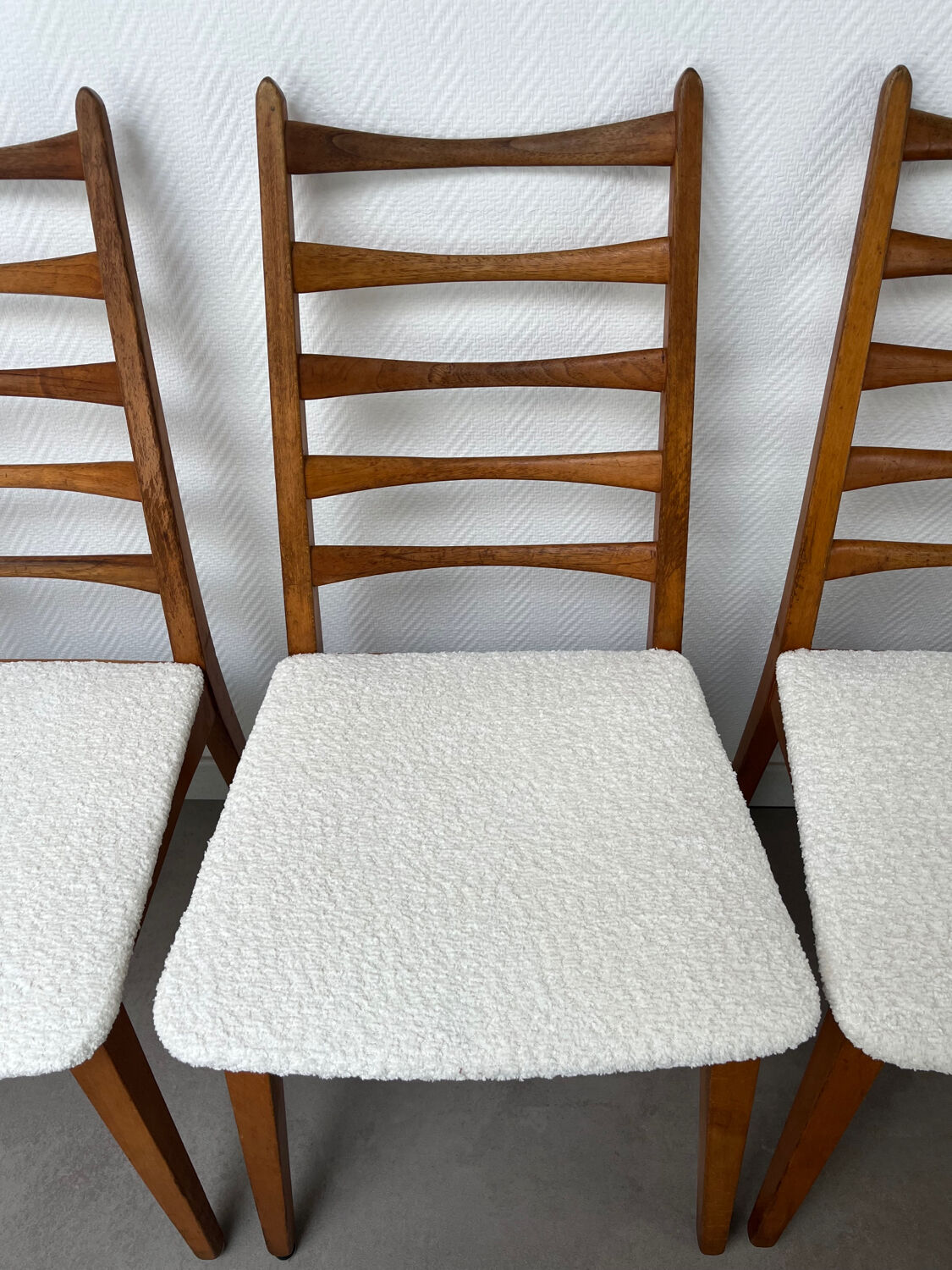 4 Scandinavian chairs, teak with boucle seats.