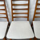 4 Scandinavian chairs, teak with boucle seats.
