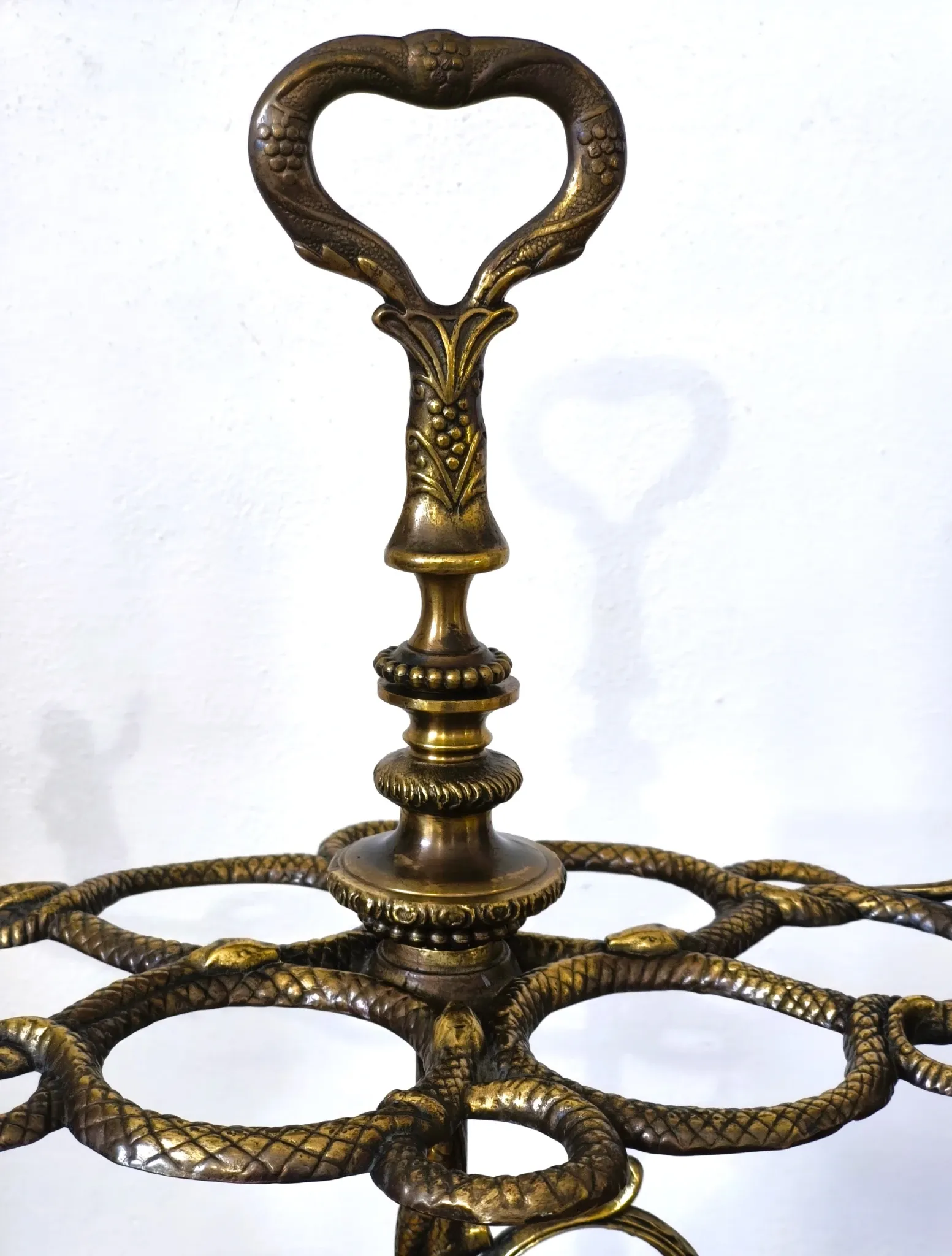 Italian brass umbrella stand, Art Nouveau style, with putti.