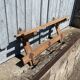 Wall-mounted coat rack in solid wood with shelf