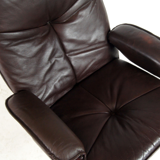Fauteuil de salon pivotant vintage en palissandre et cuir design danois rétro années 70