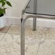 Table basse annees 70 verre et acier chromé
