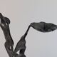 Sculptural brutalist floor candlestick made of hand-forged iron from the 1950s.