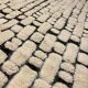 Large cream and black checked Berber rug, 280 × 200 cm.