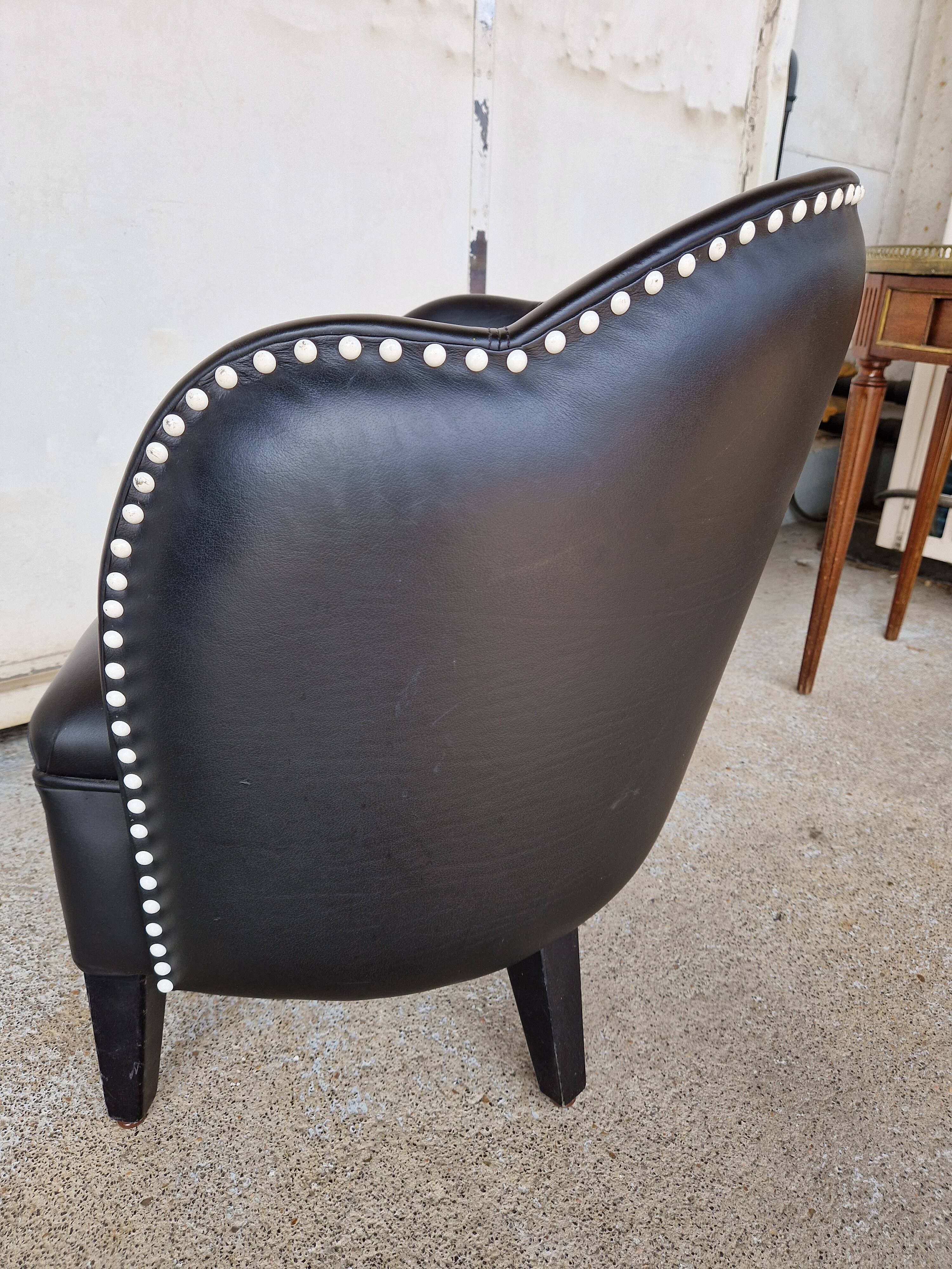 Pair of armchairs in imitation leather