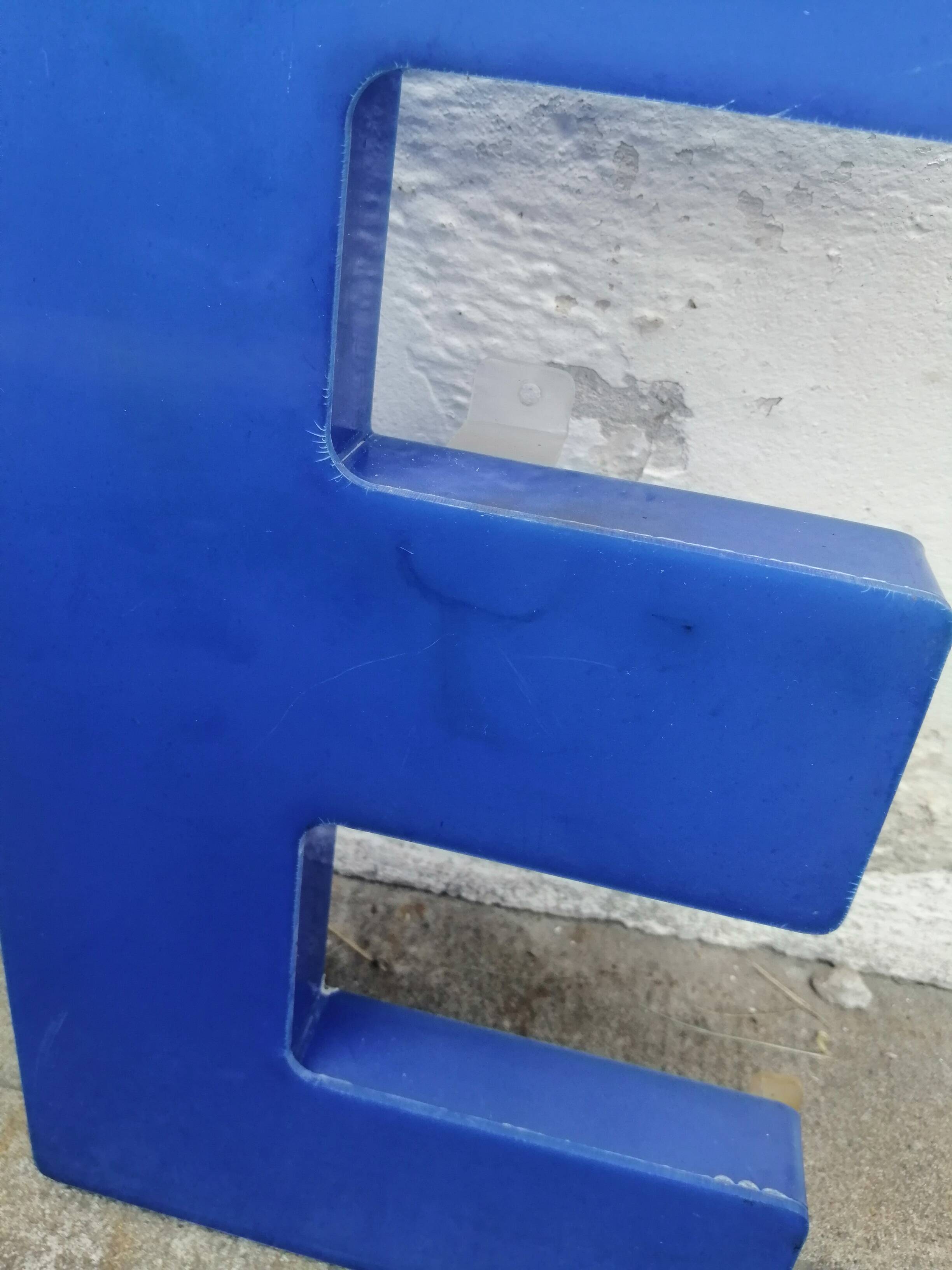 Plexiglas sign letter E