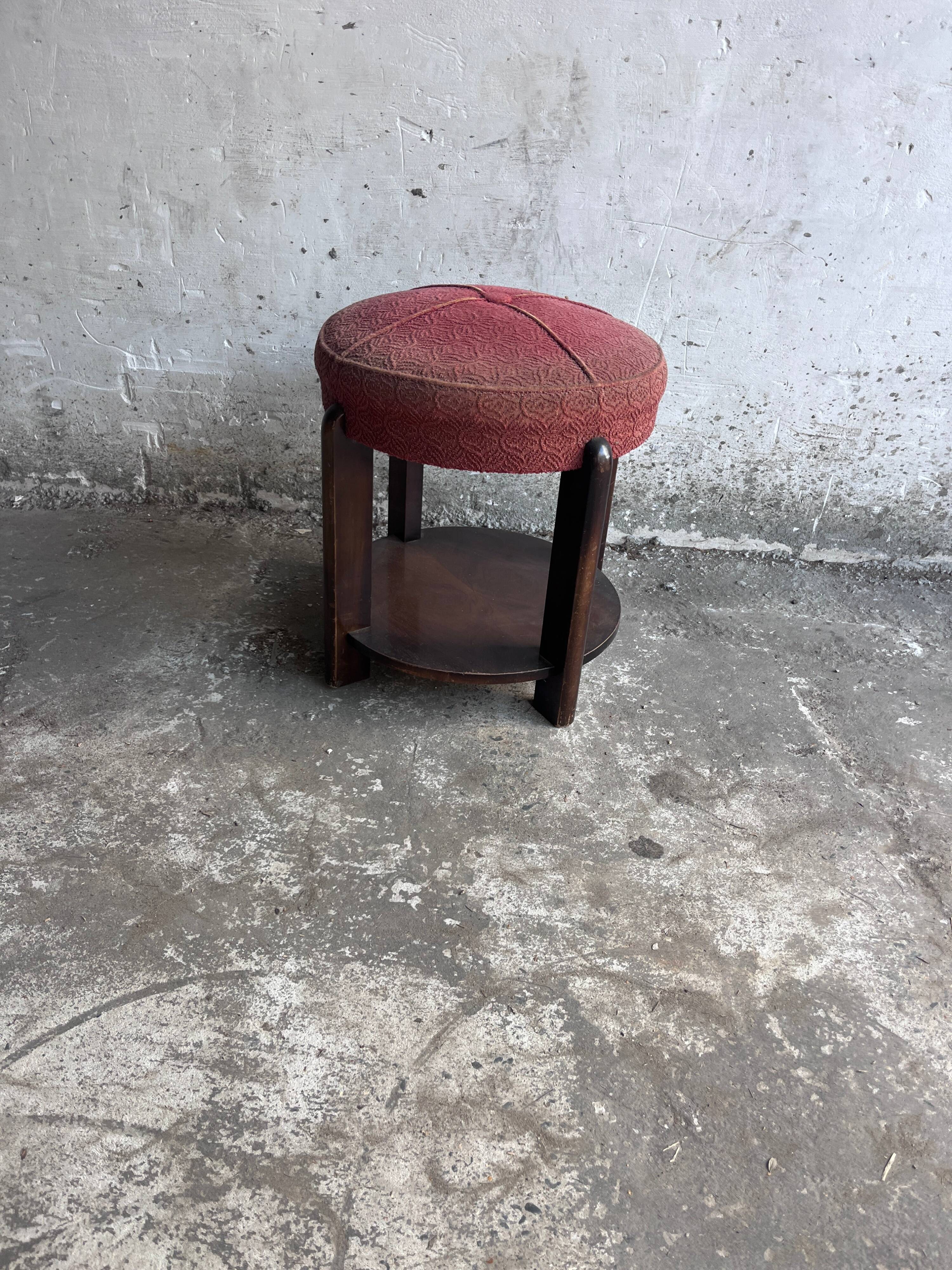 Art Deco stool upholstered with a lower shelf, France, circa 1930.