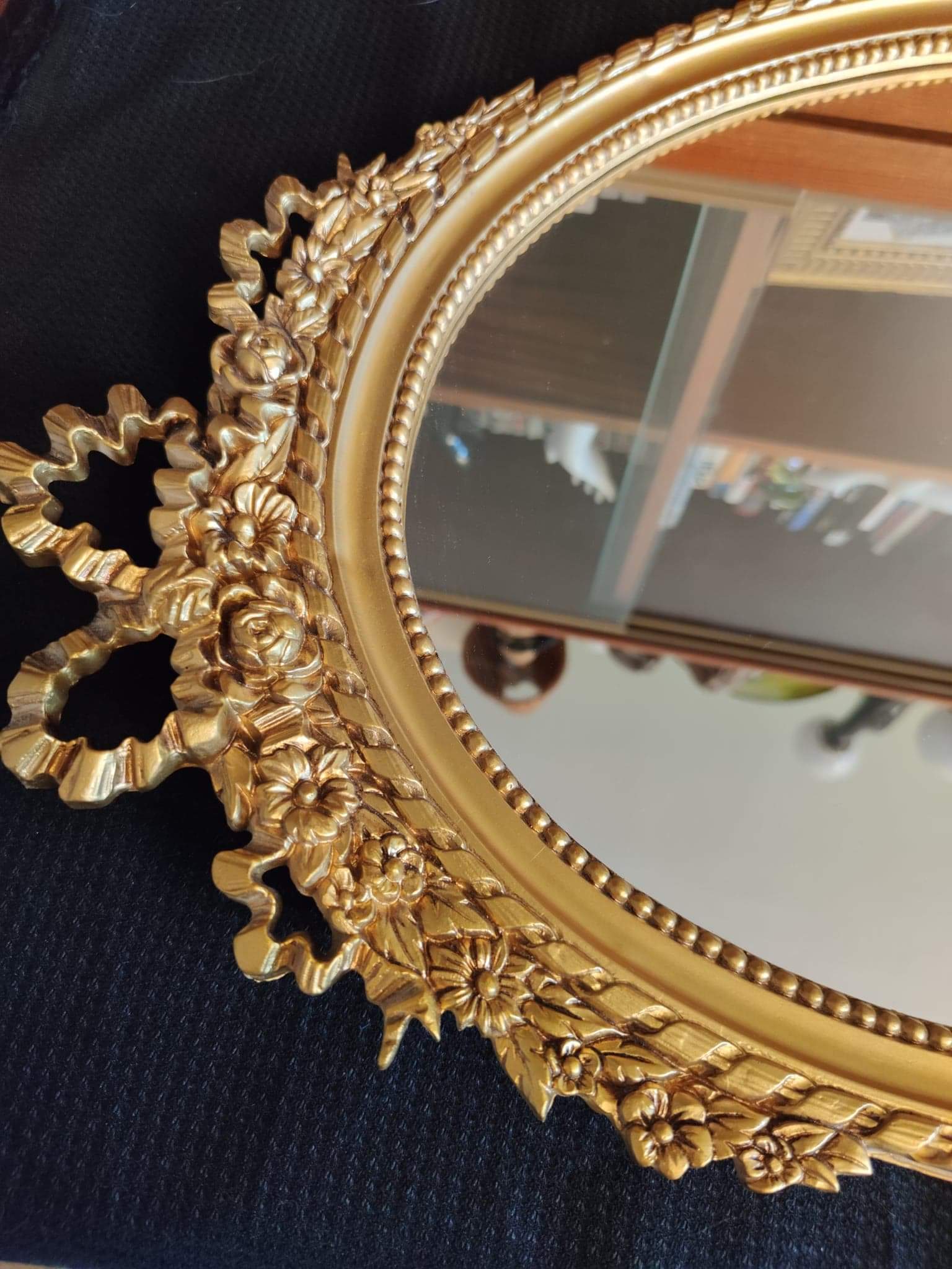 Louis XVI mirror in gold resin decorated with knots 44x62cm