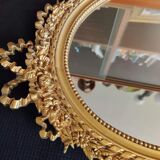 Louis XVI mirror in gold resin decorated with knots 44x62cm