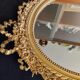 Louis XVI mirror in gold resin decorated with knots 44x62cm