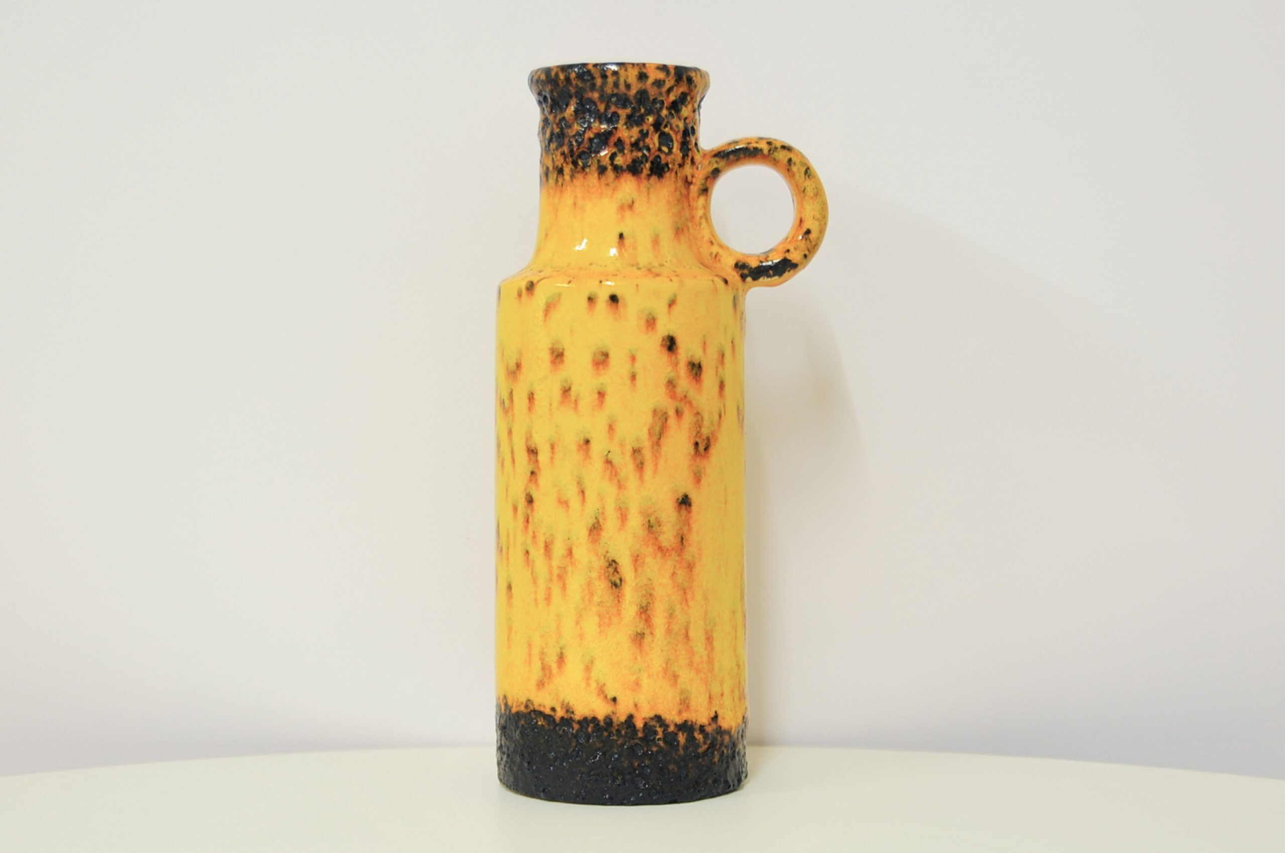 Vintage yellow and brown fatlava jug