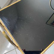 Vintage 1960s brass and smoked glass side table with magazine holder.