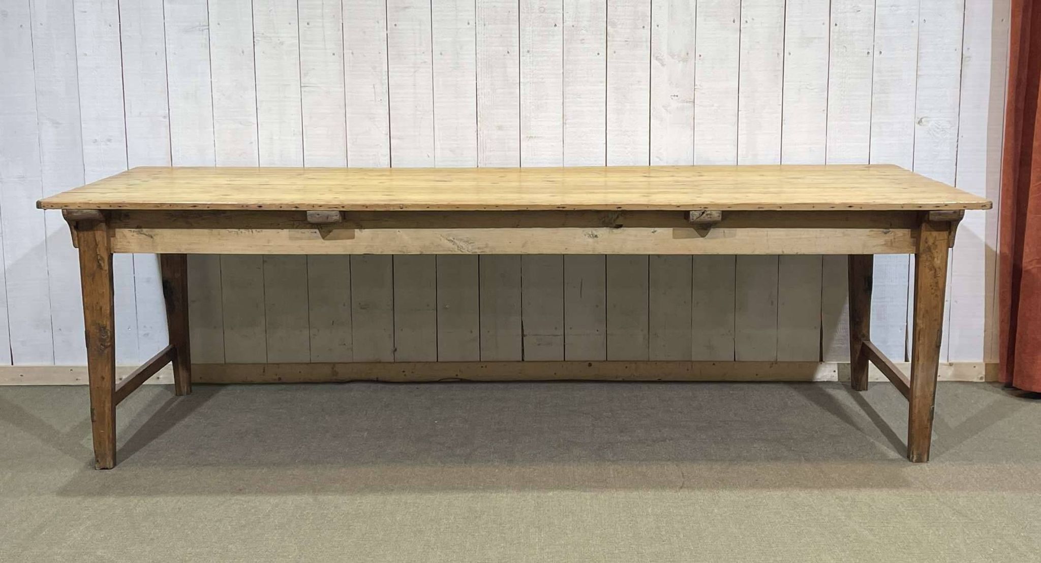 Early 20th-century farmhouse table made of fir, elm, and chestnut.