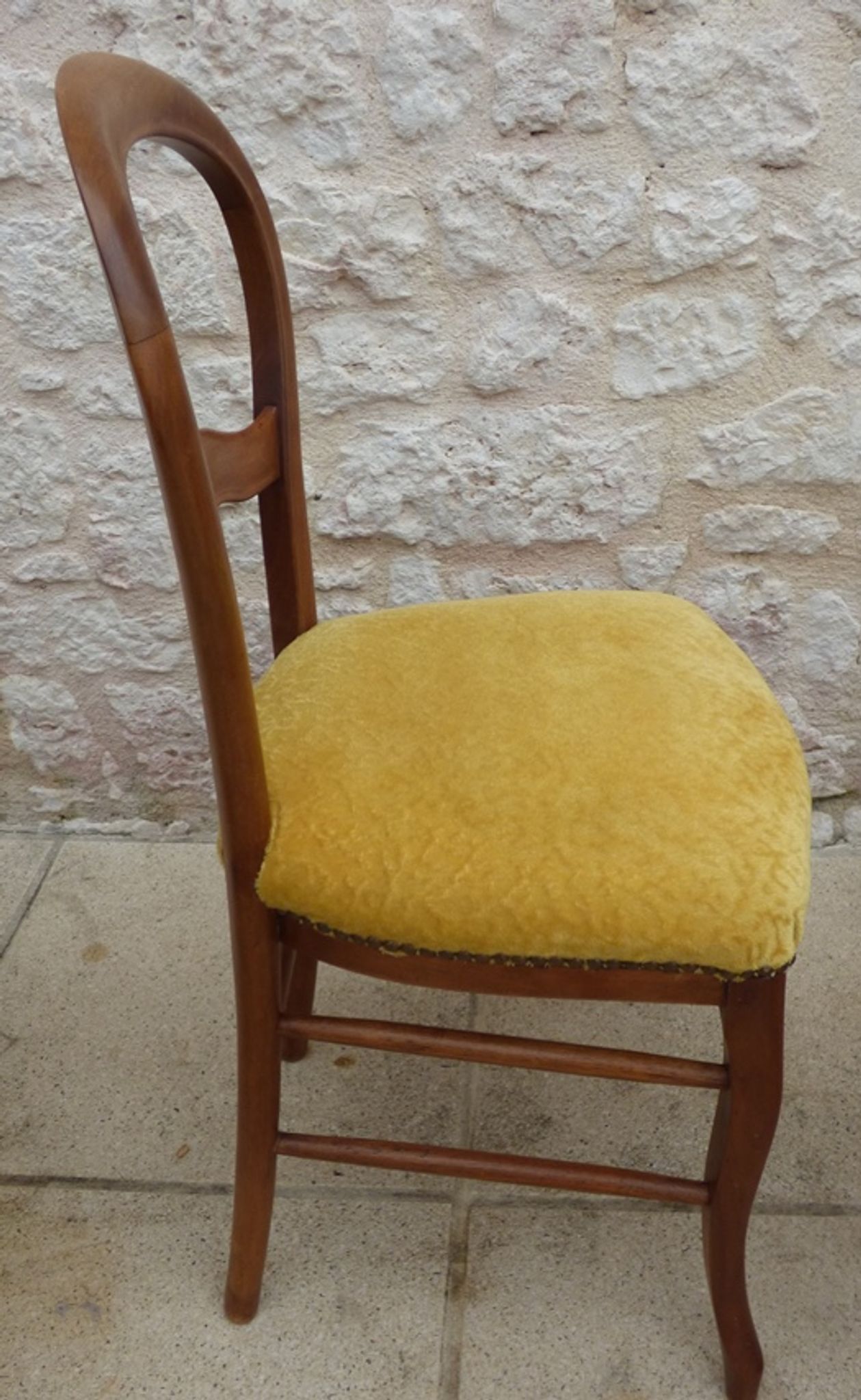Louis Philippe period chair trimmed with yellow velvet in wood