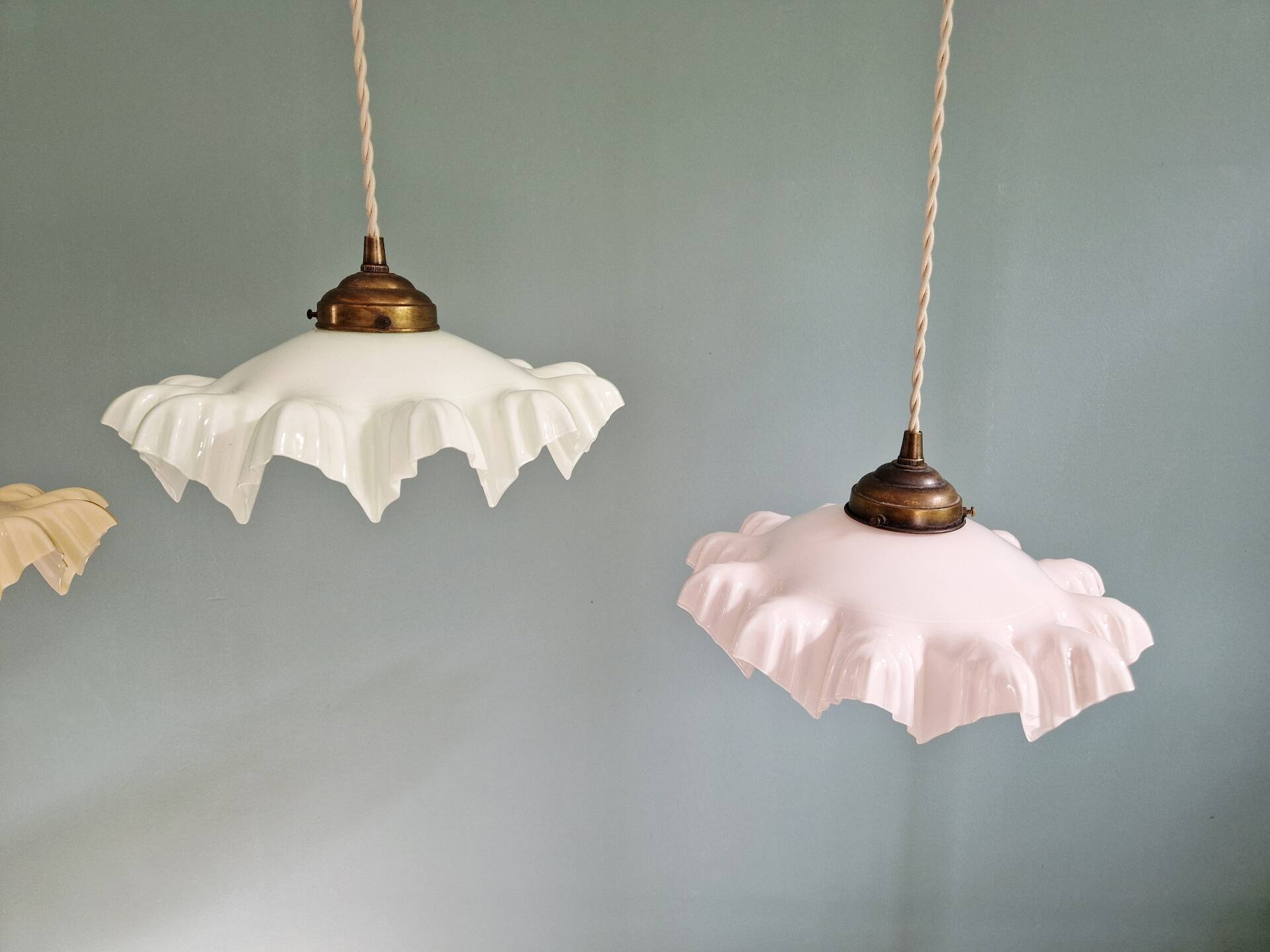 Art Deco trio of suspensions in coloured frilled opaline, 1920-30.