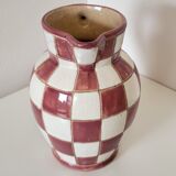 Old ceramic pitcher pattern checkerboard tiles