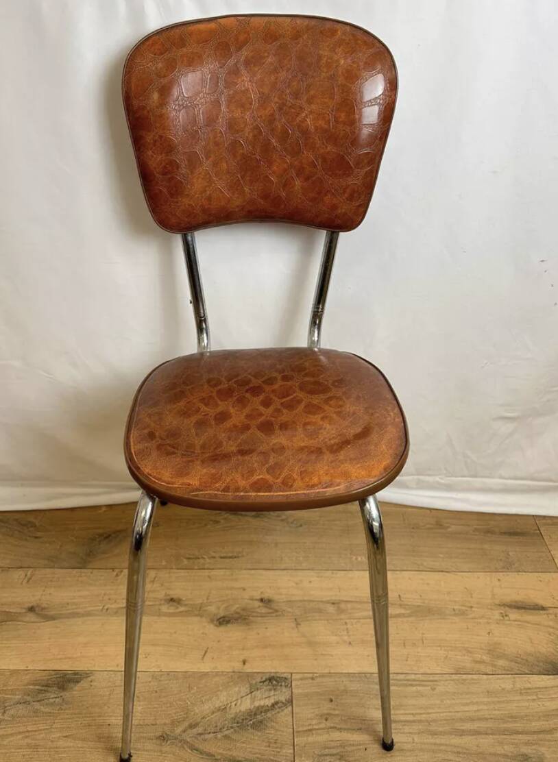 4 chairs in brown skai and chrome metal bases from the 60s