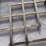 Stretch trivets in silver metal, geometric shapes