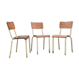 Three vintage school chairs
