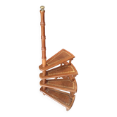 Library spiral staircase in beech and brown leather.