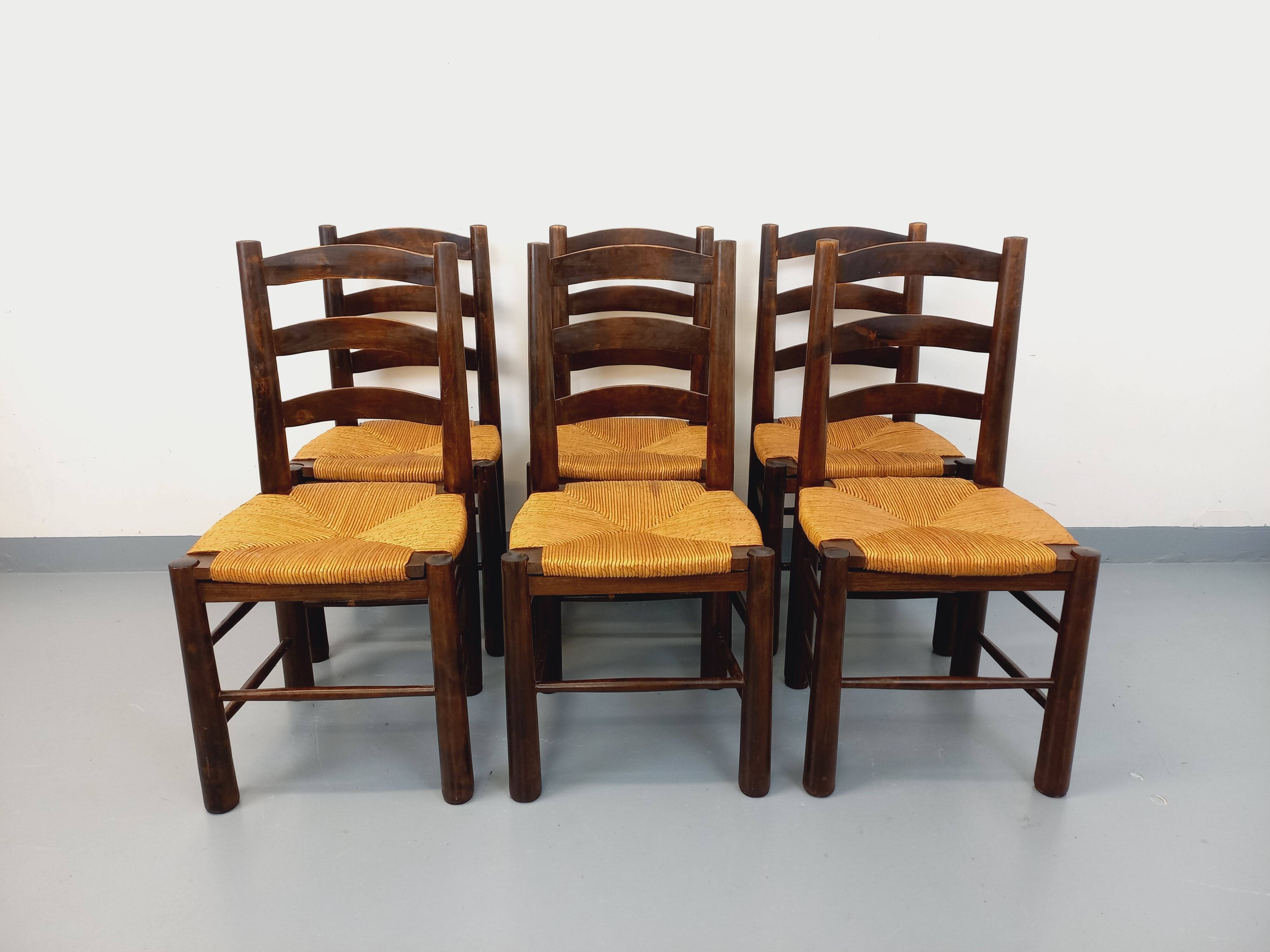 Set of 6 vintage brutalist chairs by Georges Robert in straw wood from the 1960s.