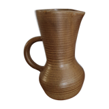 High pitcher in sandstone