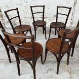 Série de 7 anciennes chaises bistrot Baumann bois courbé assise ronde