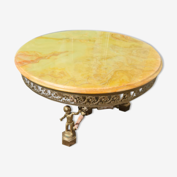 Round metal coffee table with marble top