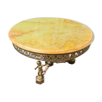 Round metal coffee table with marble top