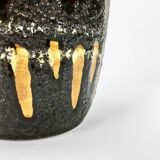 "Fat Lava" vase black background and colorful enamelled drippings