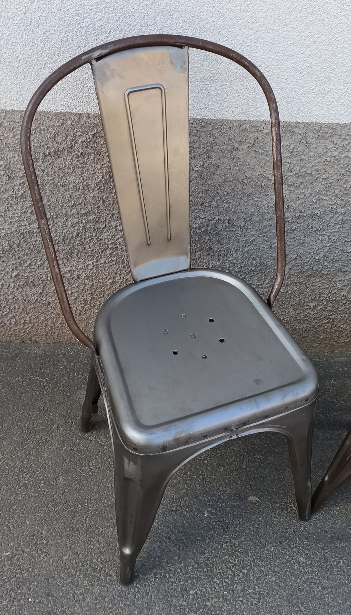 Pair of grey metal chairs