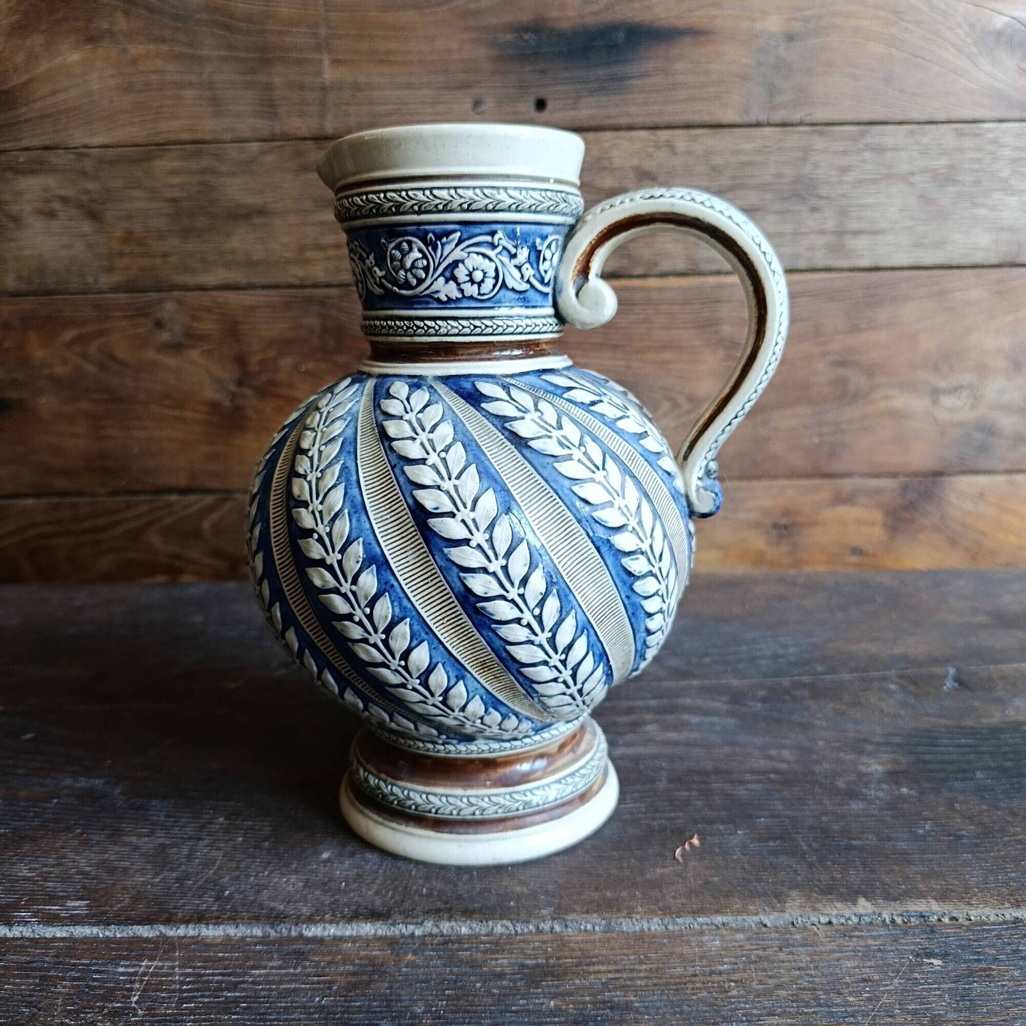 Vintage German Westerwald stoneware jug with cobalt blue floral relief