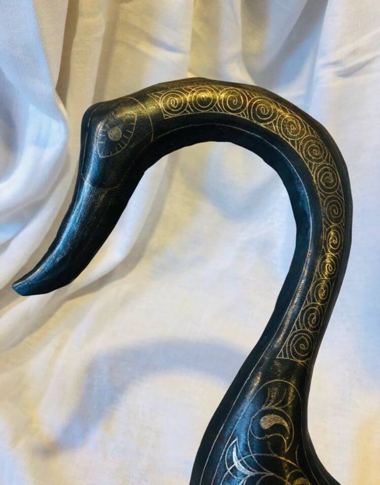 Damascened metal bird sculpture