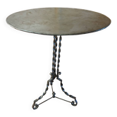 Round and antique metal side table