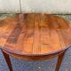 Round extendable dining table Louis XVI in cherry wood from the 1960s.