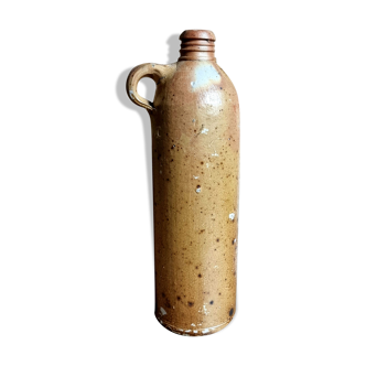 Bottle jug in ancient sandstone