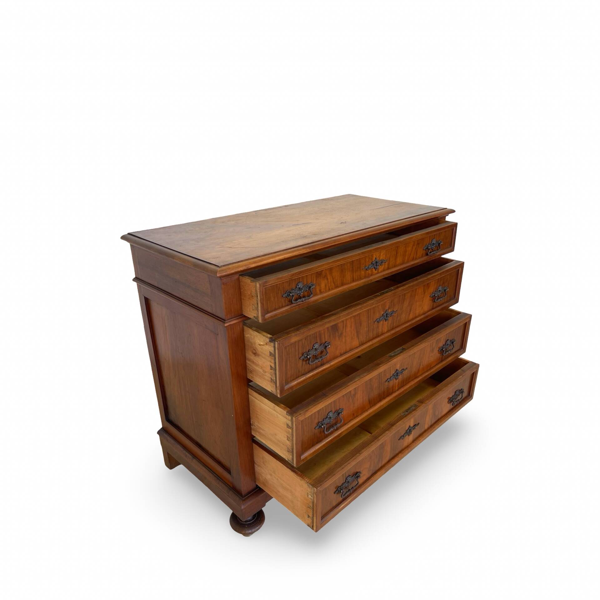 Antique walnut commode with bronze handles in the shape of a lion's mask,