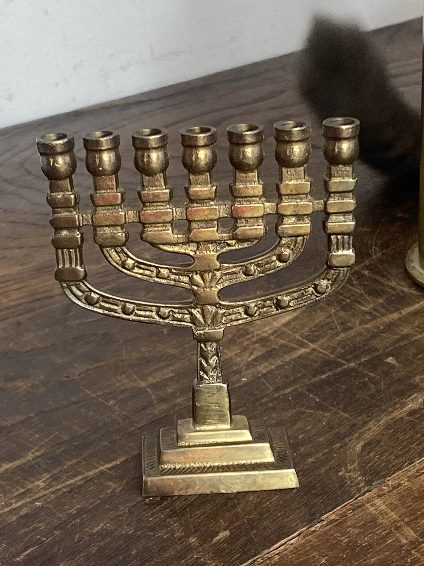 Chandelier, seven-branched menorah, in brass.