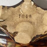 Old earthenware planter. Floral patterns.