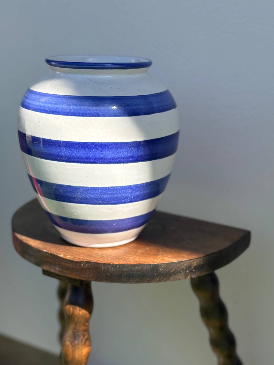 Blue striped ceramic vase