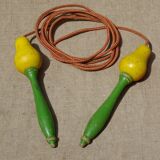 Old wooden jump rope toy painted in the shape of pear fruit ref