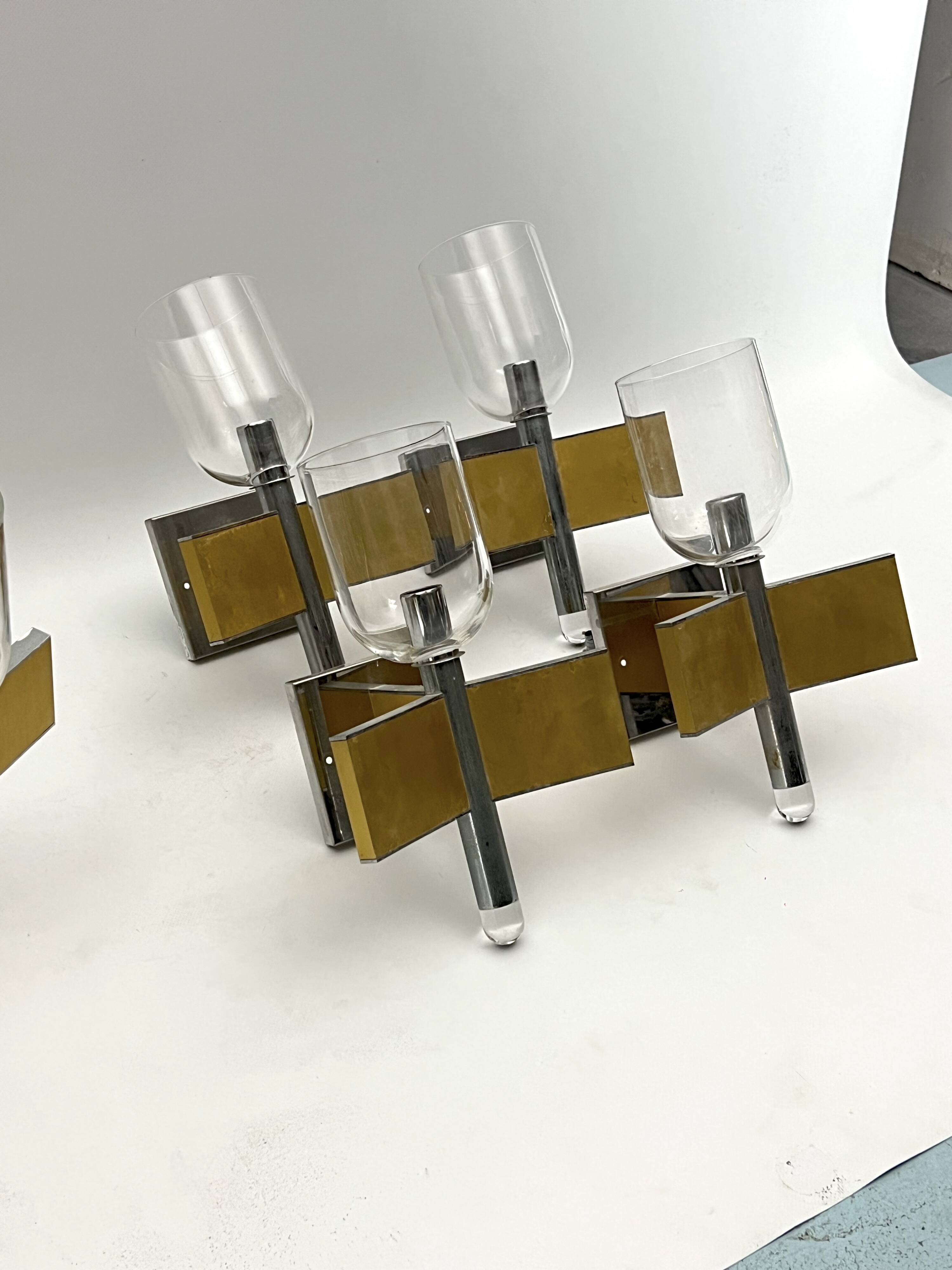 Mid-Century Modern set of eight brass and chrome sconces by Sciolari. Italy 1970s