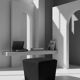Minimalist square pouffe in black suede