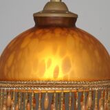 Vintage French amber mottled glass hanging ceiling light with beaded fringe.