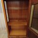 Solid wood display cabinet.