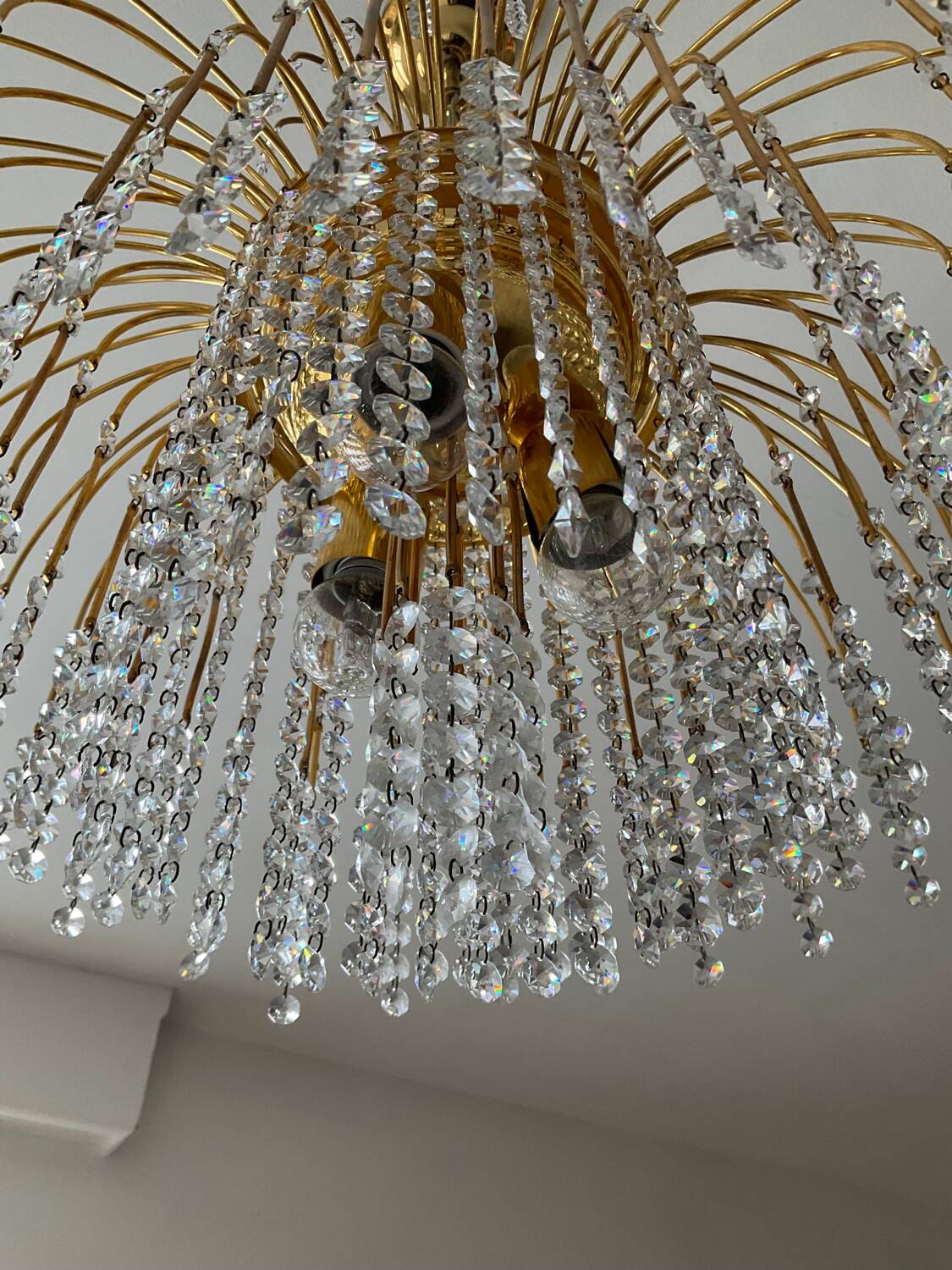 Vintage brass chandelier with crystal tassels cascade