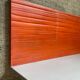 Pair of contemporary wall shelves in steel and stained wood