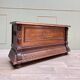 Banc coffre en bois naturel de style Louis XIII